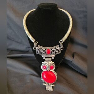 Silver-Tone Choker necklace featuring a striking red faux-stone owl pendant.